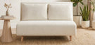 cream boucle 2 seater double folding sofa bed in modern living room with wood side table and jute rug with pot plants