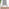 Novara Black Leg Round Glass Dining Table & 4 Grey Lorenzo Chairs