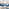 Andria Gold Leg Marble Effect Dining Table and 6 Navy Pesaro Gold Leg Chairs