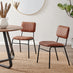 Penrose Black Round Dining Table & 4 Tan Delta Chairs