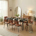 Leif Black Wood Extending Dining Table with 8 Tan Delta Chairs