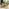 Lanai Beige Rattan & Cream 4 Seat Round Garden Dining Table