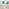 2x Milan Green Velvet Counter Stools Silver Legs