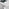Monza 4 White/Grey Dining Table & 4 Grey Milan Black Leg Chairs
