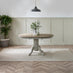 Padstow Round Whitewashed and Light Grey Solid Wood Extending 4-6 Seater Dining Table
