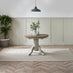 Padstow Round Whitewashed and Light Grey Solid Wood Extending 4-6 Seater Dining Table