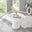 Palma White High Gloss Round Dining Table & 6 Black Milan Chrome Leg Chairs