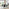 Penrose Black Round Dining Table & 4 Green Beaumont Chairs