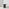 Penrose Black Round Dining Table & 4 Green Beaumont Chairs