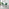 2x Pesaro Green Velvet Counter Stools Black Legs