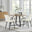Santorini Brown Round Dining Table And 4 Cream Pesaro Black Leg Chairs