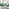 Andria Gold Leg Marble Effect Dining Table and  6 Green Pesaro Gold Leg Chairs
