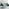 Atlanta 6 White Dining Table and 6 Green Pesaro Silver Leg Chairs