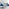 Atlanta 6 White Dining Table and 6 Navy Pesaro Silver Leg Chairs