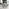 Carson White Marble Effect Dining Table & 4 Grey Calla Black Leg Chairs