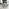Carson White Marble Effect Dining Table & 4 Grey Calla Black Leg Chairs