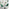 Elina White Marble Effect Round Dining Table & 2 Green Pesaro Black Leg Chairs