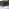 Enna Black Glass Extending Dining Table and 6 Black Milan Black Leg Chairs