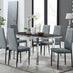 Enna Black Glass Extending Dining Table and 6 Grey Milan Black Leg Chairs