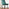 Elina White Marble Effect Round Dining Table & 2 Green Pesaro Black Leg Chairs
