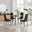 Koko Walnut Effect Round Dining Table & 4 Black Milan Black Leg Chairs