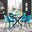 Novara Black Leg Round Glass Dining Table & 4 Blue Pesaro Black Leg Chairs