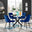 Novara Black Leg Round Glass Dining Table & 4 Navy Pesaro Black Leg Chairs