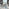 Novara Black Leg 120cm Round Glass Dining Table & 6 Grey Pesaro Black Leg Chairs