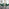 Novara 120cm Gold Round Dining Table and 6 Green Pesaro Black Leg Chairs