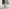 Novara White Marble Black Leg Round Dining Table & 4 Black Calla Black Leg Chairs
