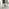 Novara White Marble Black Leg Round Dining Table & 4 Cream Pesaro Black Leg Chairs