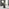 Palma Round Black Semi Gloss Dining Table 4 Grey Isola Chairs