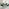 Santorini Brown Round Dining Table And 4 Green Pesaro Black Leg Chairs