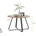 Santorini Brown Round Dining Table And 6 Black Milan Black Leg Chairs