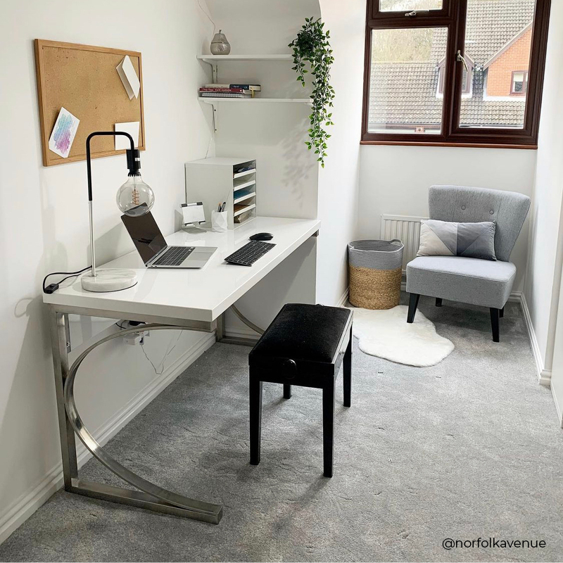 A vanity unit in a home being used as a home office desk during the day, shared by @norfolkavenue